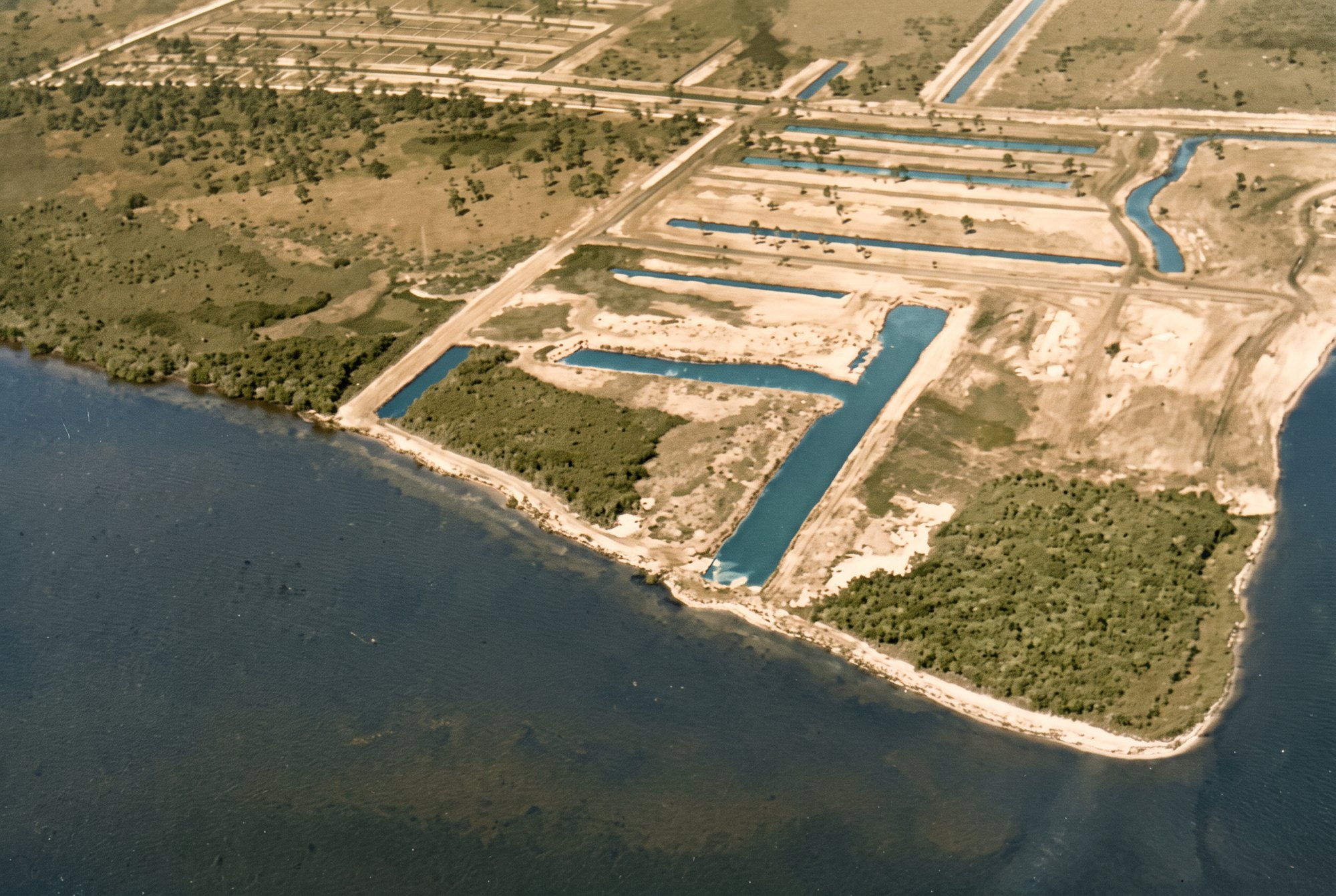 Colorized 1958 aerial of Redfish Point and the first Cape Coral canals